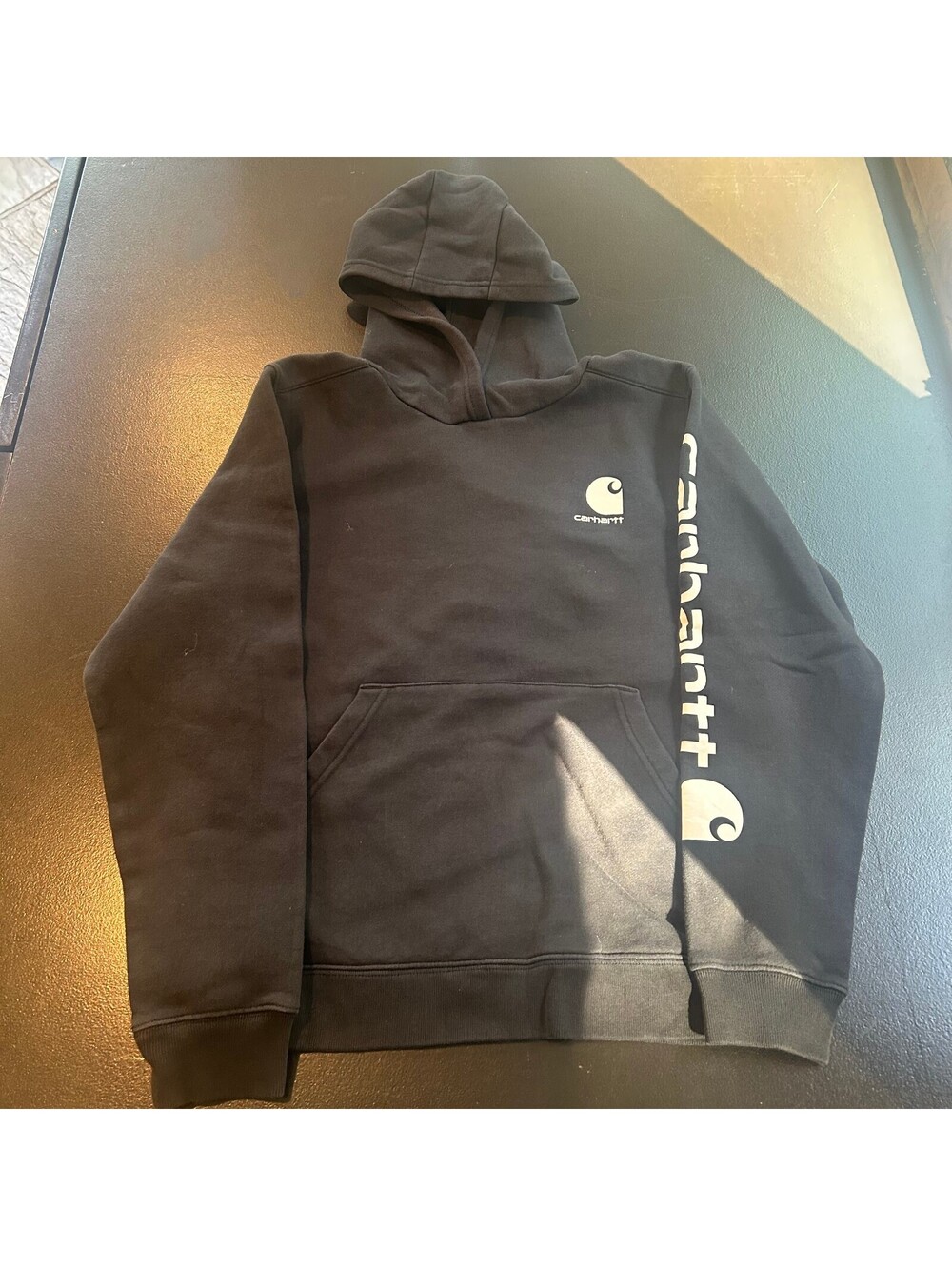Vintage workwear Carhartt Black Pullover Hoodie with Sleeve Logo XL